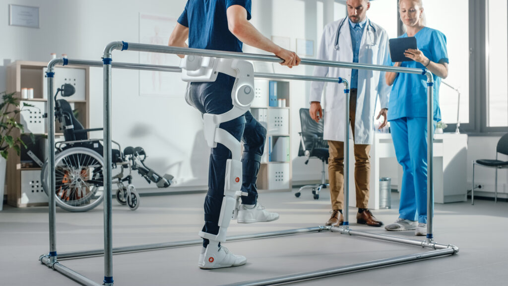 ModernHospitalPhysicalTherapyPatientWithInjuryWalksWearingAdvanced - Invest Brampton | Brampton Economic Development - Invest Brampton | Brampton Economic Development